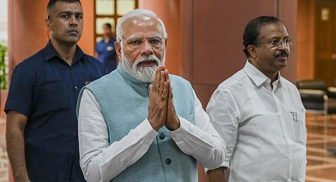 Prime Minister Narendra Modi with Union MoS for Parliamentary Affairs V. Muraleedharan arrives for the BJP Parliamentary party meeting. (Photo | PTI)