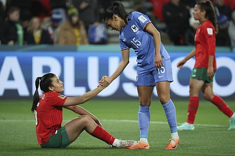 France's Kenza Dali, right, consoles Morocco's Nesryne El Chad following the Women's World Cup round of 16 soccer match. (Photo | AP)