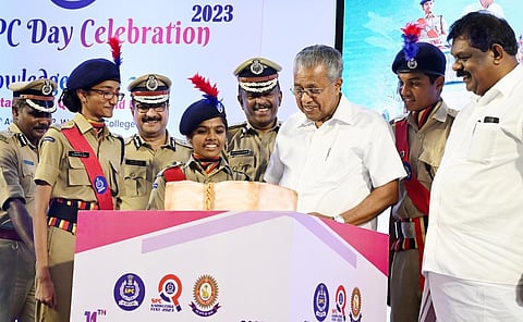 Chief Minister Pinarayi Vijayan cutting a cake during the 14th anniversary of the Student Police Cadet project at Govt Women’s College on Tuesday. (Photo | Vincent Pulickal)
