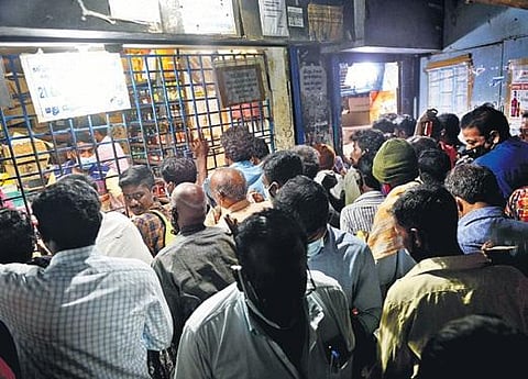 Representational image: File photo of people crowding at a Tasmac outlet in Chennai | Express
