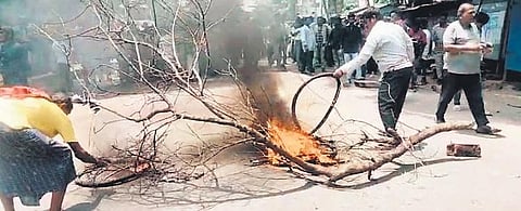 BJD workers staging road blockade at Digapahandi on Thursday | Express