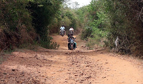 Residents of Pungampattunadu face a daily challenge as they navigate a rough five-km road to access basic necessities. (Photo | S Dinesh)