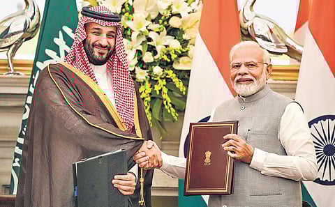 Saudi crown Prince Mohammed bin Salman and Prime Minister Narendra Modi shake hands after signing the minutes of their meeting, in New Delhi on Monday. (Photo | PTI)