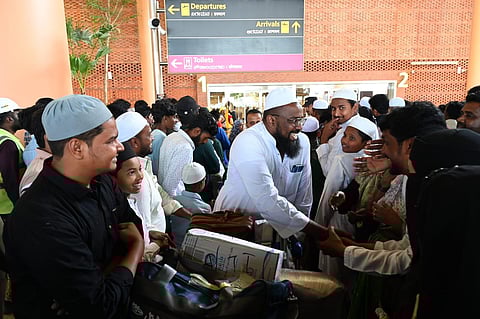 Passengers coming out of Saudi Airlines flight SV 866 - the first international flight to land at Terminal 2 of KIA Airport in Bengaluru. (Nagaraja Gadekal, EPS)