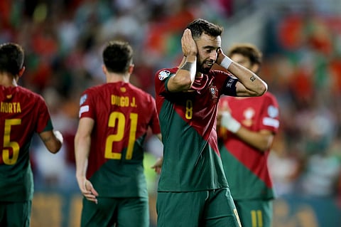Portugal's Bruno Fernandes reacts after scoring his side's eighth goal during the Euro 2024 group J qualifying soccer match between Portugal and Luxembourg. (Photo | AP)