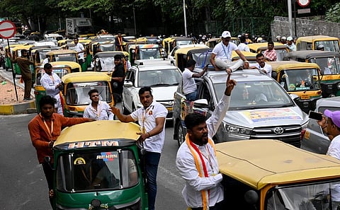 Autorickshaw drivers take out a rally before the private transport bandh was called off, in Bengaluru on Monday. (Photo | Shashidhar Byrappa)