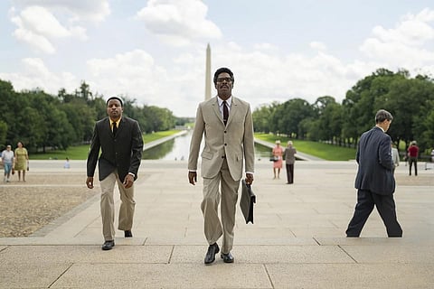 Jeffrey Mackenzie Jordan, left, and Colman Domingo as Bayard Rustin in a scene from 'Rustin.' (Photo | Netflix via AP)