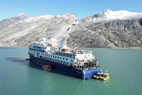 A view of the Ocean Explorer, a Bahamas-flagged Norwegian cruise ship which ran aground in northwestern Greenland on Sept 12, 2023. (Photo | AP)