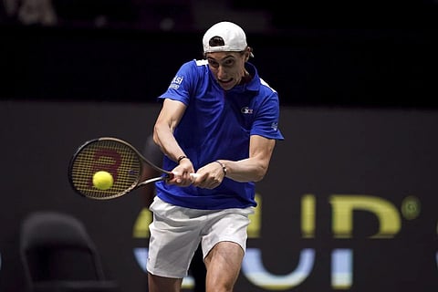 France's Ugo Humbert in action against Switzerland's Stan Wawrinka (not pictured) during the Davis Cup group sage match in Manchester, Britain. (Photo | AP)
