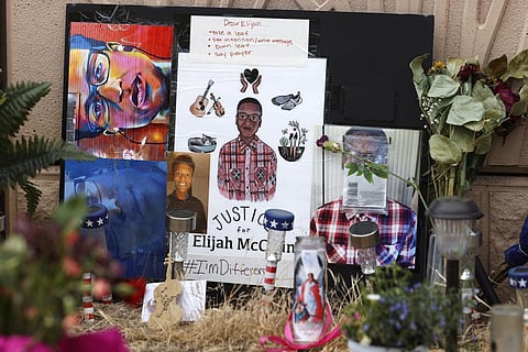 In this July 3, 2020, file photo, a makeshift memorial stands at a site across the street from where Elijah McClain was stopped by police officers while walking home in Aurora, Colo. (Photo | AP)