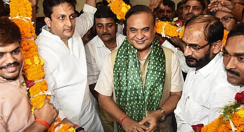 Assam Chief Minister Himanta Biswa Sarma being garlanded by BJP workers during the latter's visit in Bihar, in Patna, Friday, Sept. 15.(Photo | PTI)