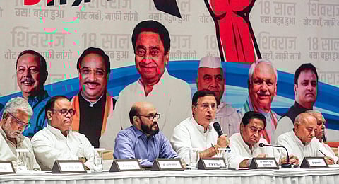 AICC General Secretary and Randeep Singh Surjewala with State Congress President Kamal Nath and other leaders during a press conference regarding party's 'Jan Aakrosh Yatra.(Photo | PTI)