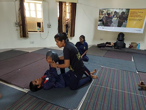 Asha Suman with students