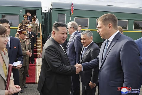 North Korean leader Kim Jong Un (C) steps down from his train in Artyom, near Vladivostok, Russian Far East on Saturday, Sept. 16, 2023. (Photo | AP)