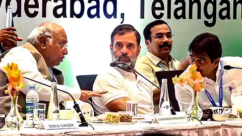 Congress President Mallikarjun Kharge with party leaders Rahul Gandhi and K.C. Venugopal during the second day of Congress Working Committee meeting, in Hyderabad, September 2023.