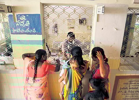 Women gather at the pharmacy to collect the prescribed medicines at the CHC at Eturnagaram in Mulugu district | Sri Loganathan Velmurugan