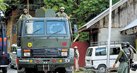 Security personnel at Gadol Kokarnag in Anantnag district on Sunday. (Photo | PTI)