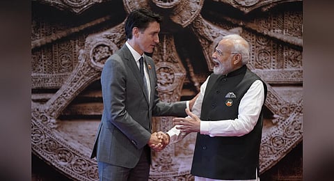PM Narendra Modi welcomes his Canadian counterpart Justin Trudeau at the Bharat Mandapam for the G20 Summit, in New Delhi, Sept. 9, 2023. (Photo | AP)