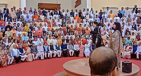 Lok Sabha and Rajya Sabha members pose for a group photograph at the old Parliament House complex during the special session | PTI