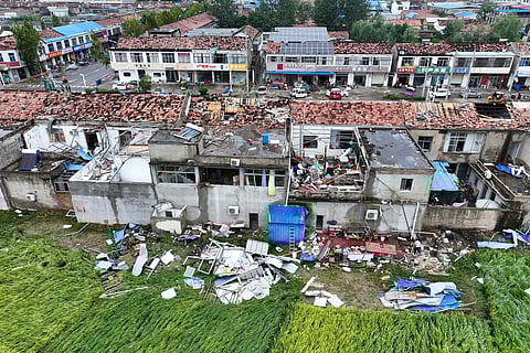 This aerial view shows damaged buildings after a tornado hit the city of Suqian, in China's eastern Jiangsu province on September 20. (Photo | AFP)