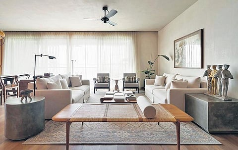 In situ image of a Tangali bench and two upholstered easy arm chairs