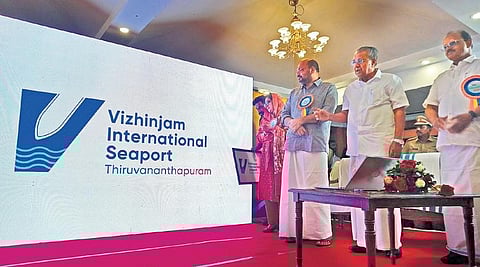 Chief Minister Pinarayi Vijayan unveils the logo of Vizhinjam International Seaport Thiruvana nthapuram at the launch function held at Mascot Hotel on Wednesday