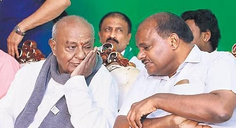 HD Deve Gowda with his son HD Kumaraswamy.(File Photo | Express)