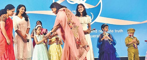 Apollo group Executive Vice Chairperson Preethe Reddy and Group Oncology & International Director Operations Harshad Reddy with the young cancer survivors during an event held in Chennai | P Jawahar