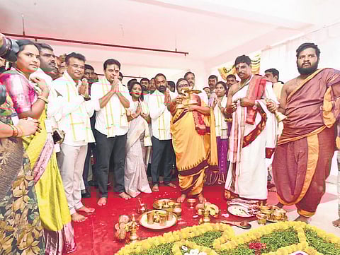 MA&UD Minister KT Rama Rao performs puja before distributing 2BHK houses to the beneficiaries in Dundigal on Thursday | Express