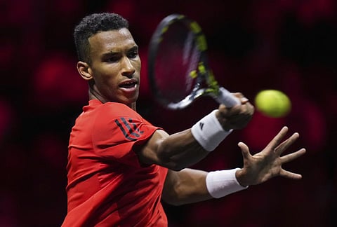 Team World's Felix Auger-Aliassime returns to Team Europe's Gael Monfils during a Laver Cup tennis match Friday, Sept. 22, 2023. (Photo | AP)