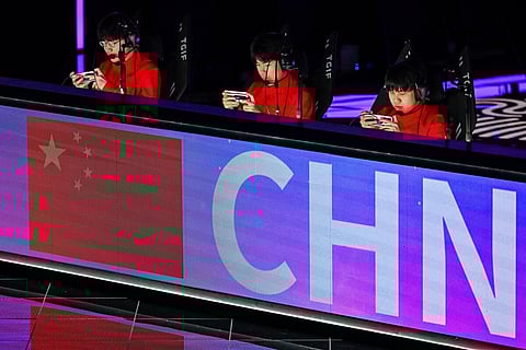 China Esports players participate in quarter-final game between Myanmar and China during the Hangzhou 2022 Asian Games in Hangzhou. (Photo | AFP)