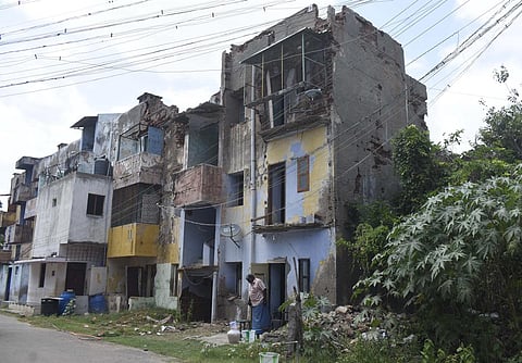 Damaged houses at Singanallur housing unit in Coimbatore. (S Senbagapandiyan)