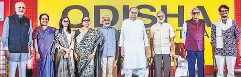 Ramnath Goenka Sahithya Samman awardees Perumal Murugan (fifth from left), Anirudh Kanisetti (extreme right) and Devika Rege (third from left) with Odisha Chief Minister Naveen Patnaik (fourth from ri