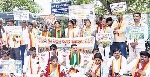 Protesters raise slogans during a dharna called by Raitha Hitarakshana Samithi, against the release of Cauvery water to Tamil Nadu, in Mandya on Sunday | EXPRESS