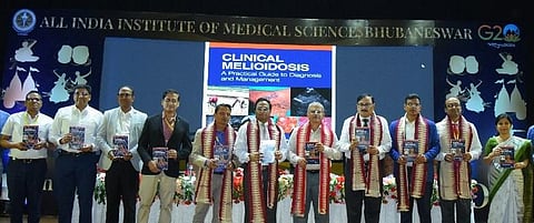 Dignitaries releasing a book on clinical features of melioidosis at AIIMS. (Photo | Express)