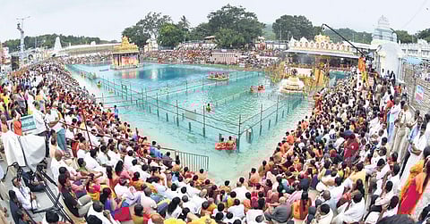 Chakrasnanam being performed at the Swami Pushkarini on Tuesday | Madhav K