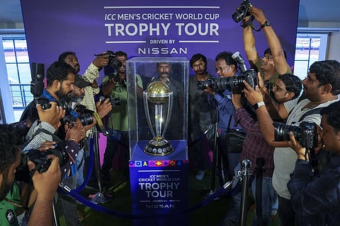 FILE - Photographers take pictures during a trophy tour of the upcoming ICC Men's Cricket World Cup at the Rajiv Gandhi International Cricket Stadium in Hyderabad, Sept. 21, 2023. (Photo | AP)
