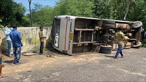 The ill-fated bus at Chandahandi ghat in Nabarangpur district. (Photo | Express)