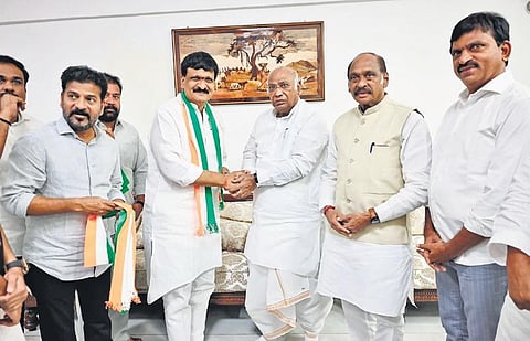 AICC president Mallikarjun Kharge welcomes Malkajgiri MLA Mynampally Hanumantha Rao into the Congress in New Delhi on Thursday