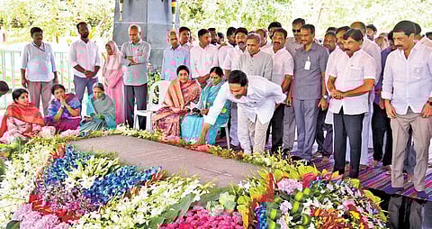 Chief Minister YS Jagan Mohan Reddy places a wreath on the Samadhi of his father YS Rajasekhara Reddy at Idupulapaya on Saturday | Express