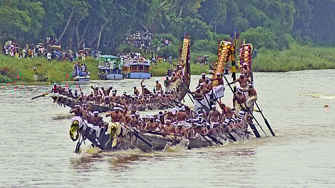 Palliyodams contesting in the Aranmula Uthrittathi Boat Race in the Pampa waters on Saturday. (Photo| Shaji Vettipuram)