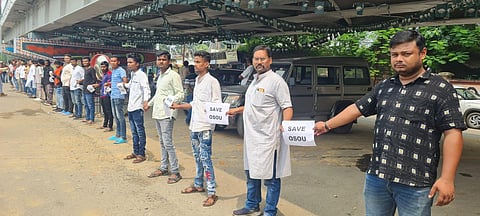 Residents participating in the human chain at Sambalpur on Friday | express