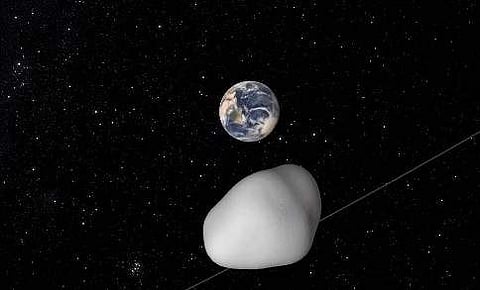 Illustration of an asteroid passing by Earth | Nasa Twitter