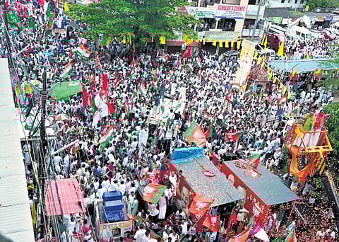 The final show of strength by workers of various political parties to mark the culmination of the open campaigning for Puthuppally by-election on Sunday | Express