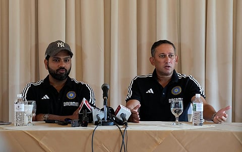 BCCI Chairman of selection committee Ajit Agarkar, right, and cricket captain Rohit Sharma announce the Indian squad for the upcoming World Cup in Pallekele, Sri Lanka, on Sept. 5, 2023. (PTI)