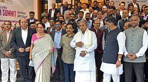 Chief Minister Siddaramaiah, Dy CM D K Shivakumar, IT/BT Minister Priyank Kharge and industry leaders during a preparatory meeting for the Bengaluru Tech Summit . (Photo | Nagaraja Gadekal)