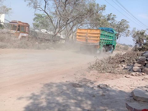 A lorry from a quarry, leaving behind a trail of dust at K Eraiyur in Perambalur | Express