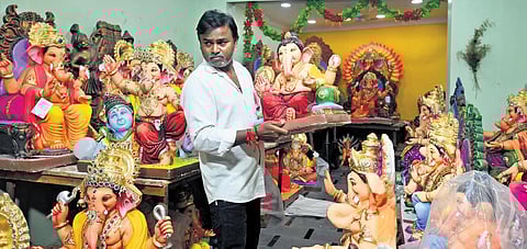 A vendor seen displaying Ganesh idols at his shop for the upcoming Ganesh festival in Hyderabad | Vinay Madapu