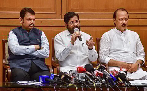 FILE - Maharashtra Chief Minister Eknath Shinde (C) with Deputy Chief Ministers Devendra Fadnavis (L) and Ajit Pawar (R) after a meeting on the issue of 'Maratha' reservation. (Photo | PTI)