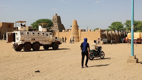 UN vehicles patrolling the military junta-led West African nation.